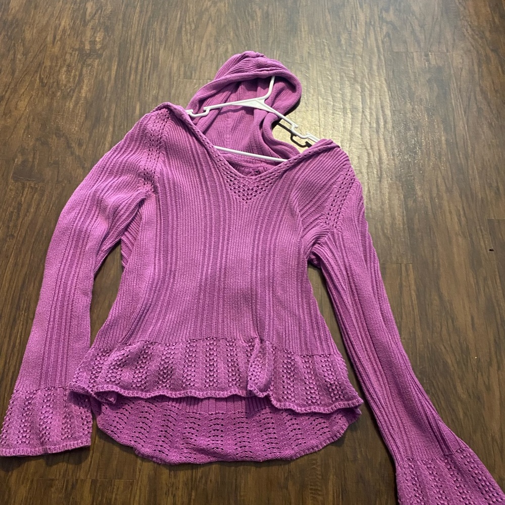woman’s shirt with a hood